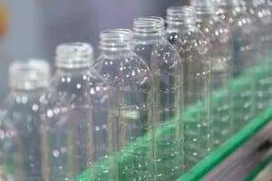 Plastic water bottles on an assembly line